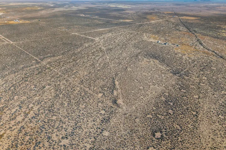 Aerial view of property's location with rural landscape