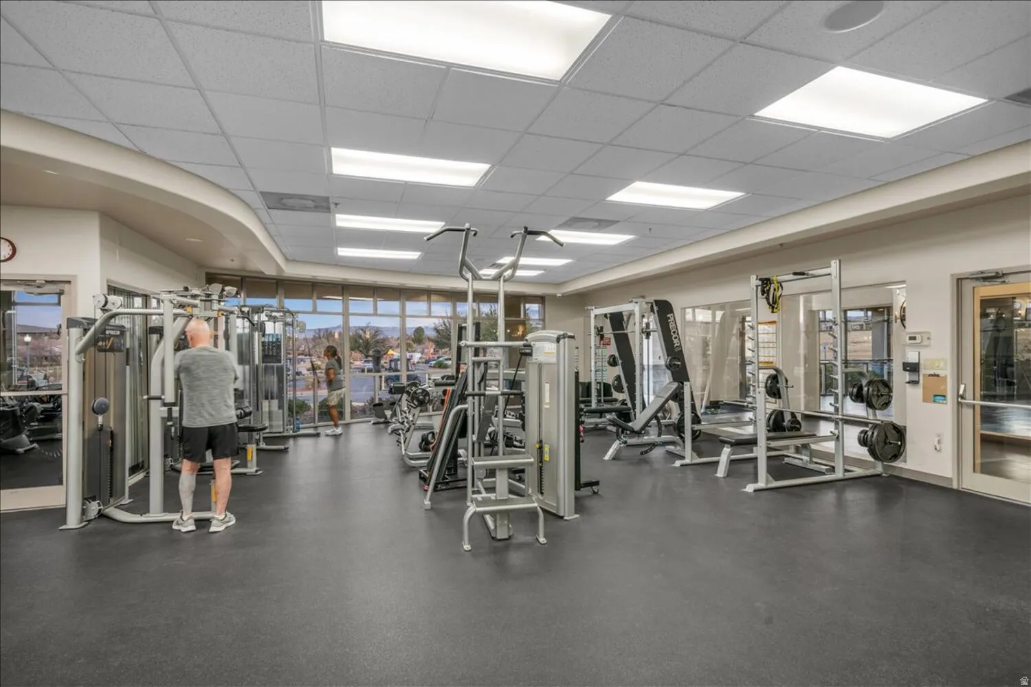 Gym with a paneled ceiling