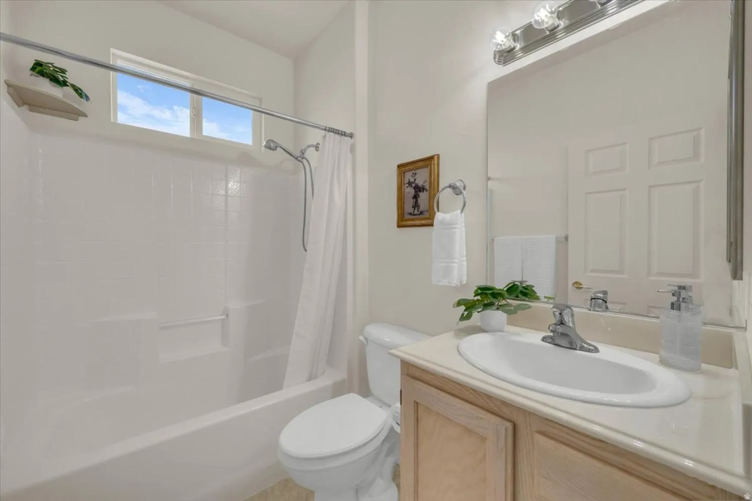 Full bath with vanity and shower / bathtub combination with curtain