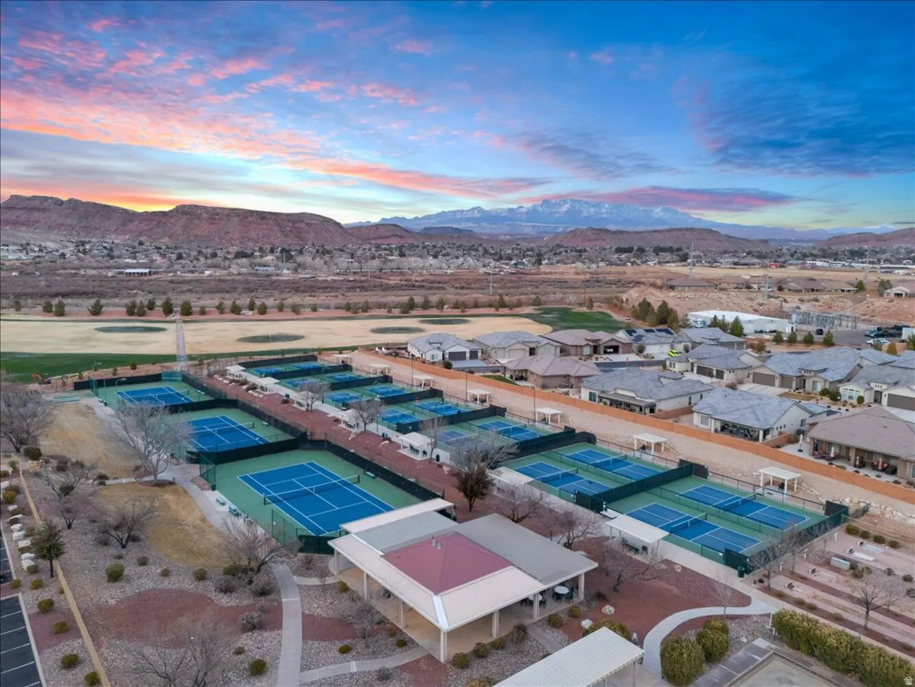 Aerial view at dusk of a mountain view and a residential view