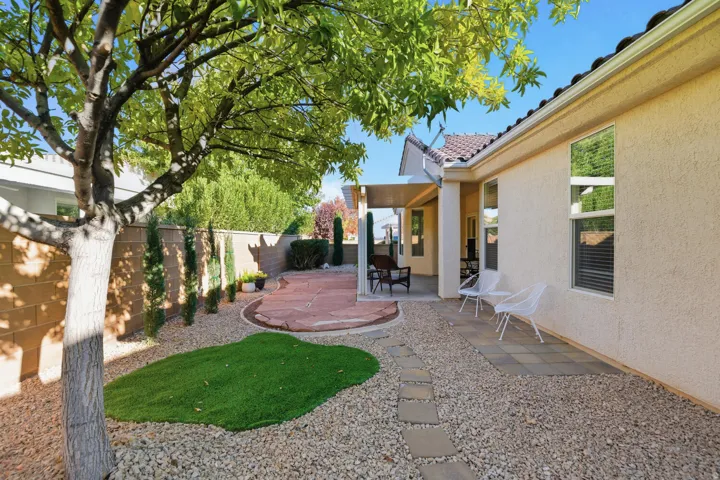 Fenced backyard featuring a patio area