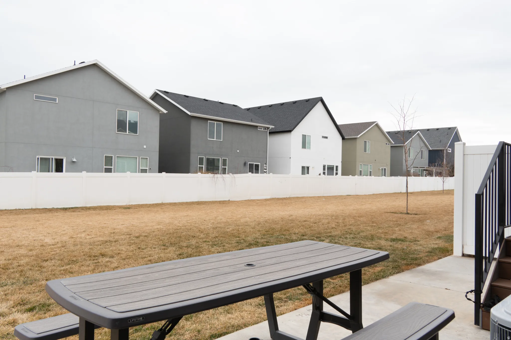 Fenced yard with a patio