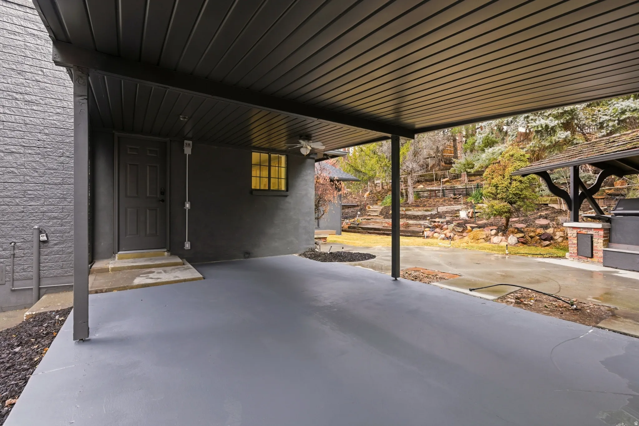 View of patio / terrace with a ceiling fan and grilling area