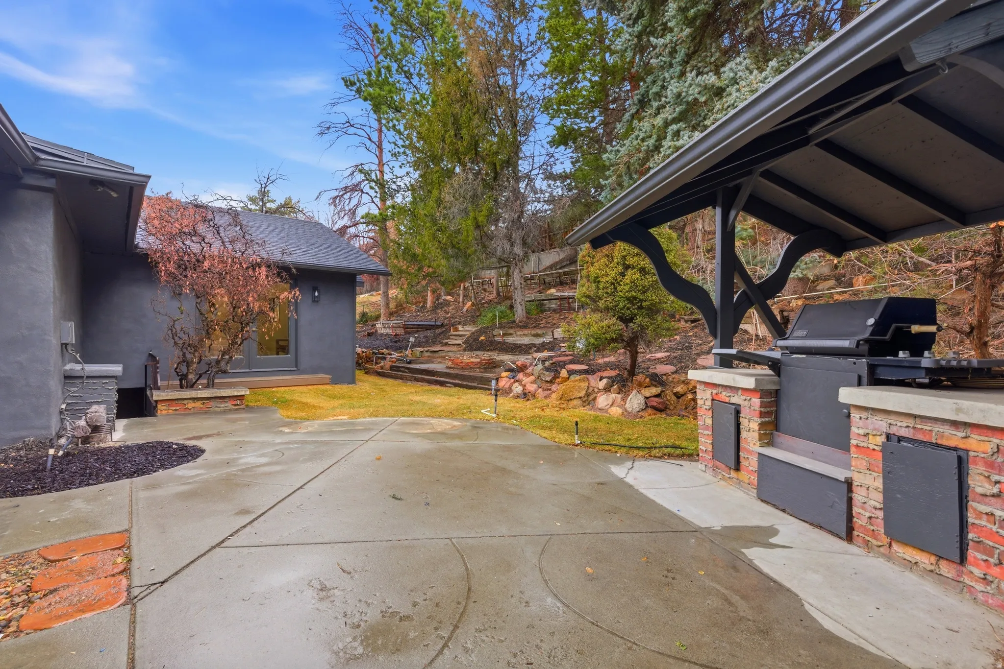 View of patio featuring an outdoor kitchen
