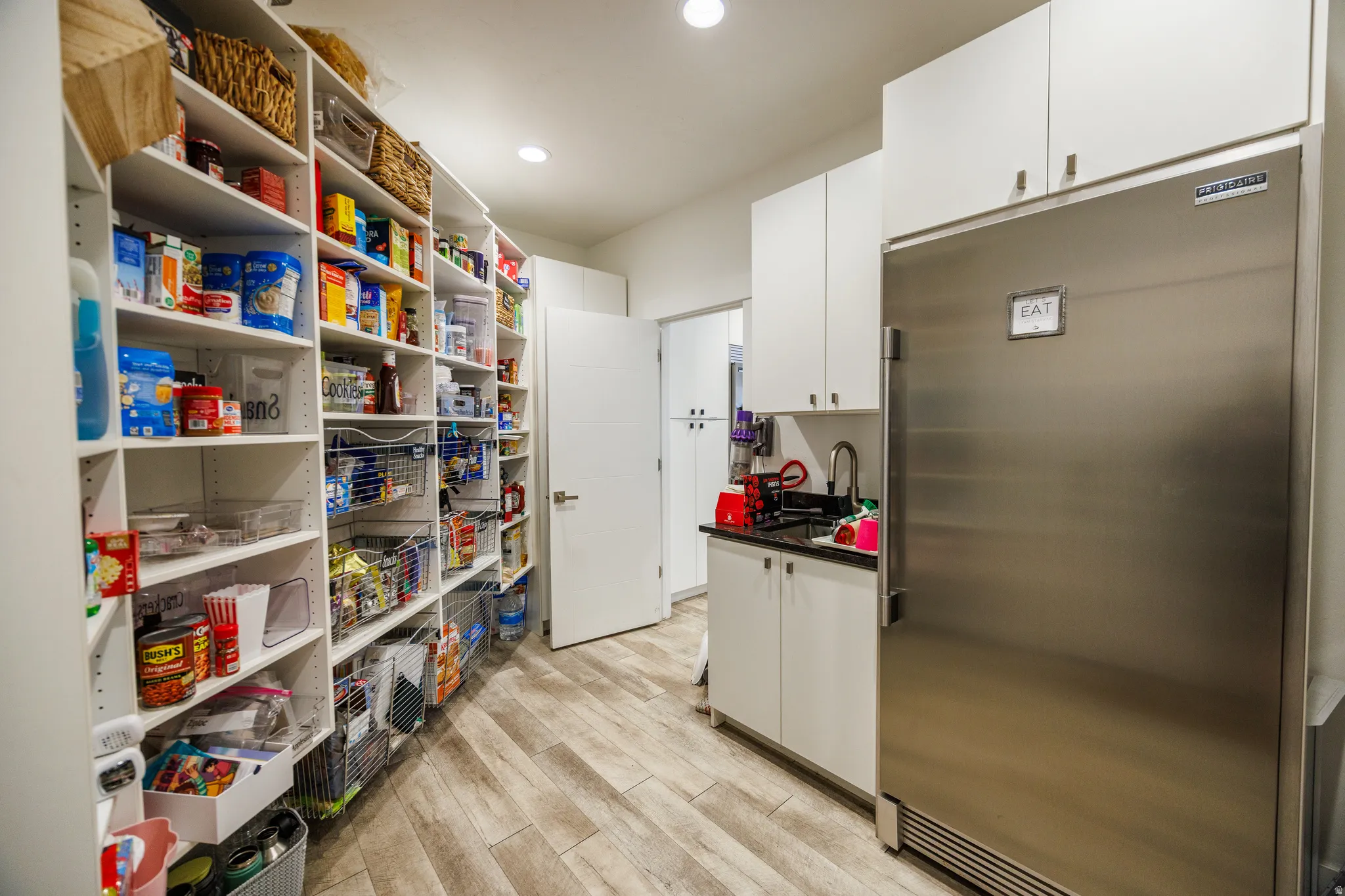 Storage area featuring a sink