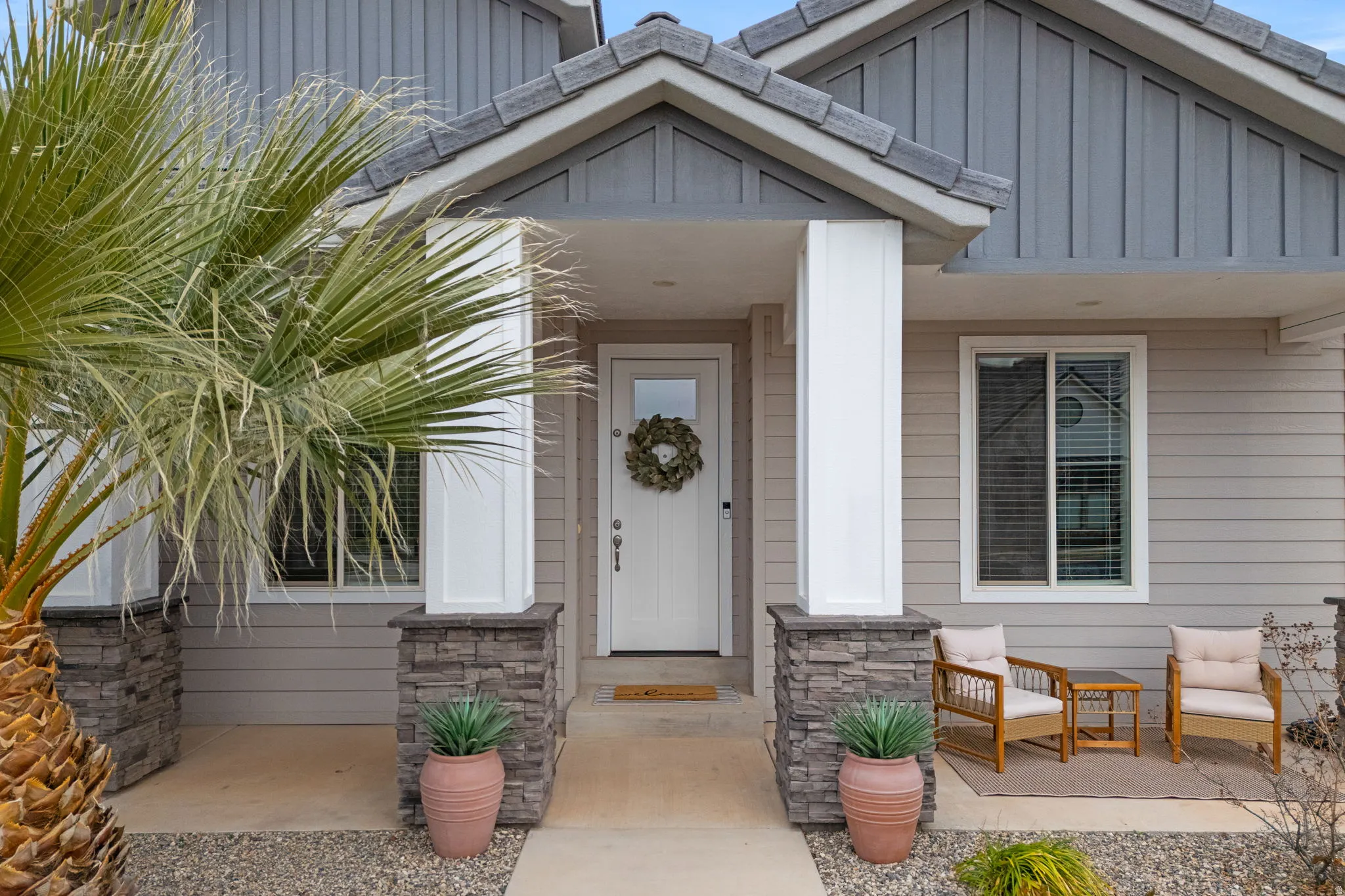 Entrance to property with board and batten siding