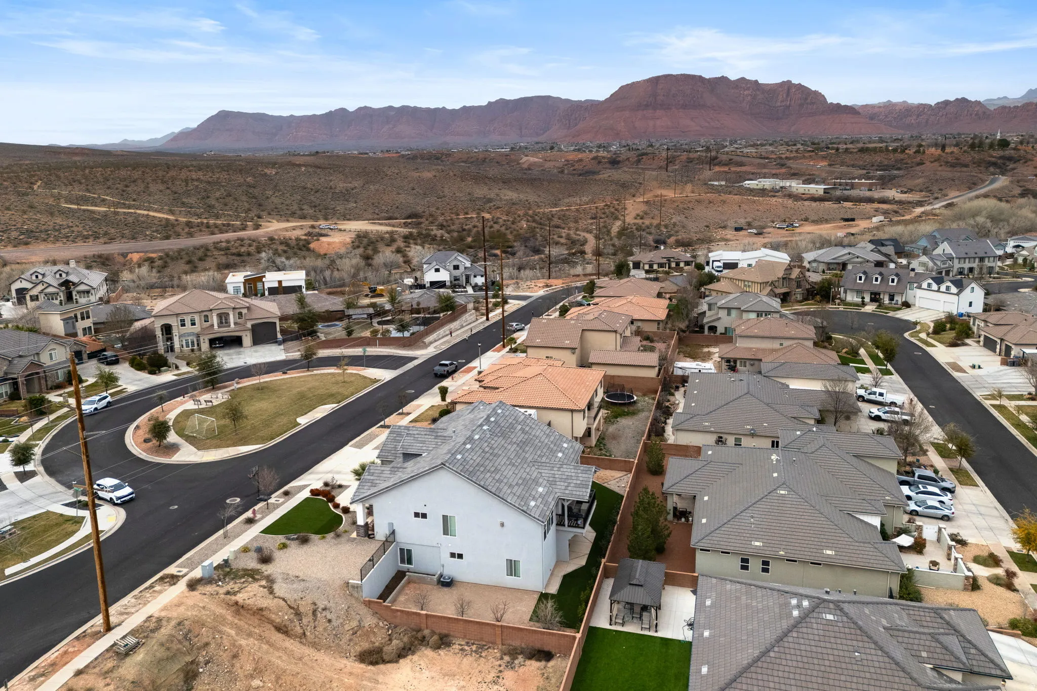Aerial perspective of suburban area featuring mountains