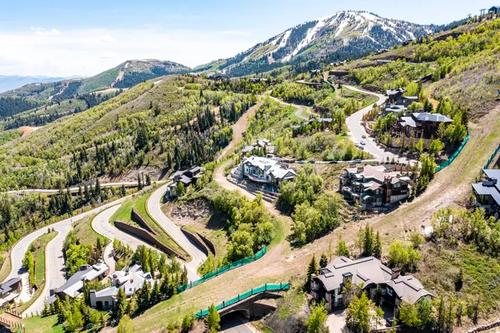 Mountainous landscape featuring residential properties and winding roads