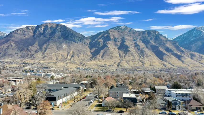 View of mountain background featuring nearby suburban area