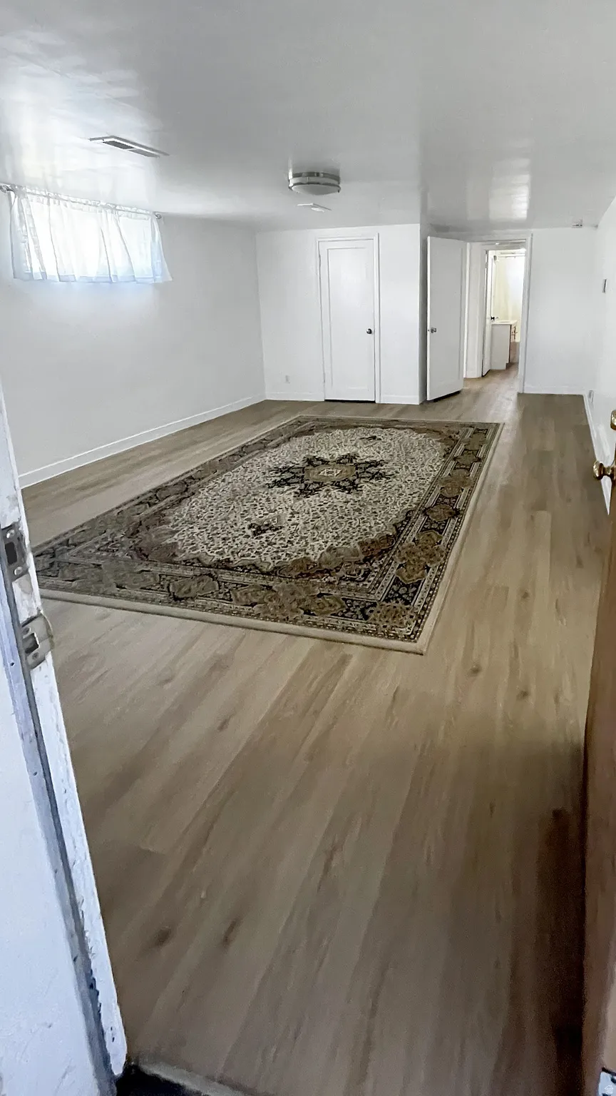 Family Room with light wood-style floors