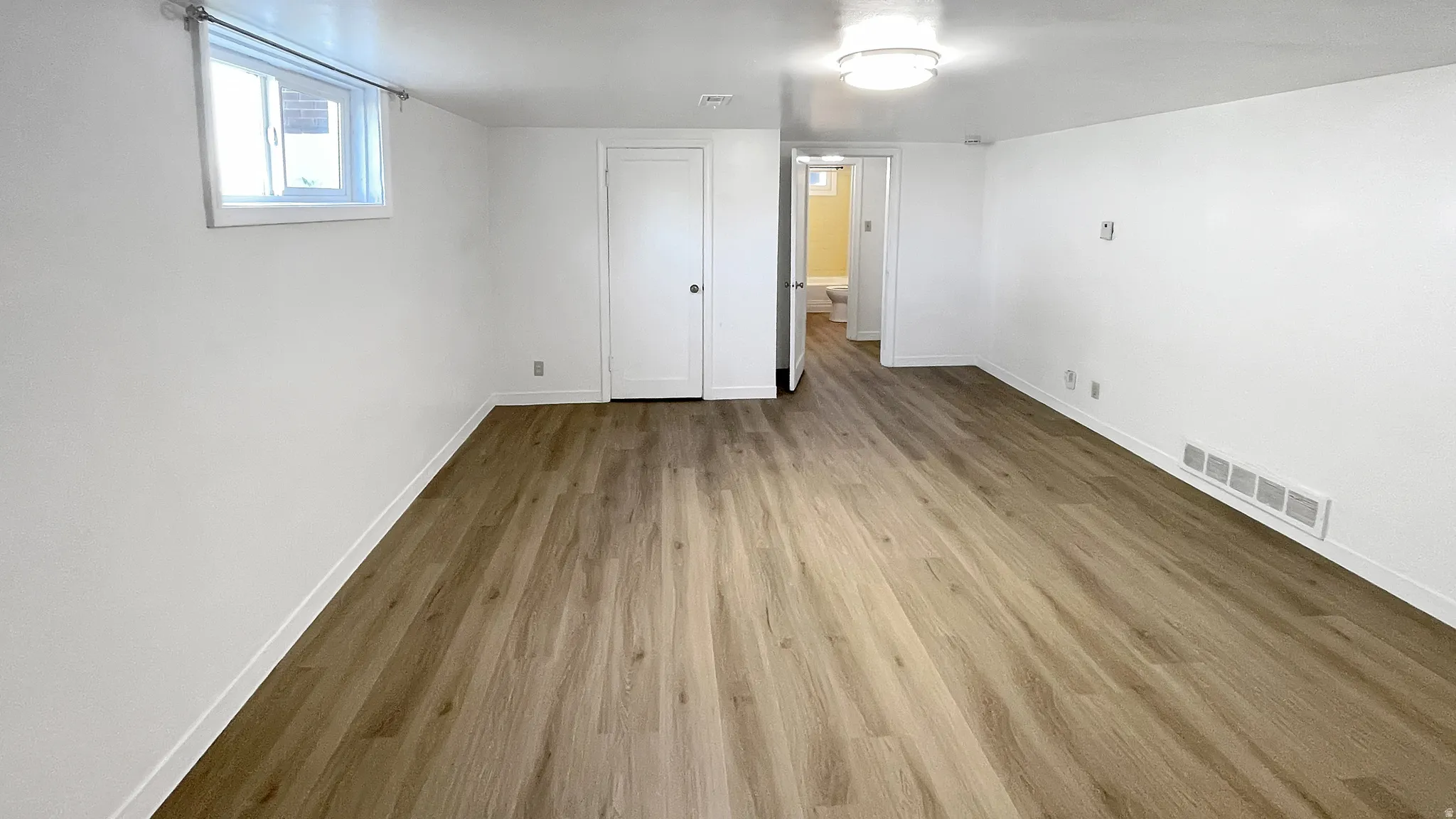 382 Family room with wood finished floors and baseboards