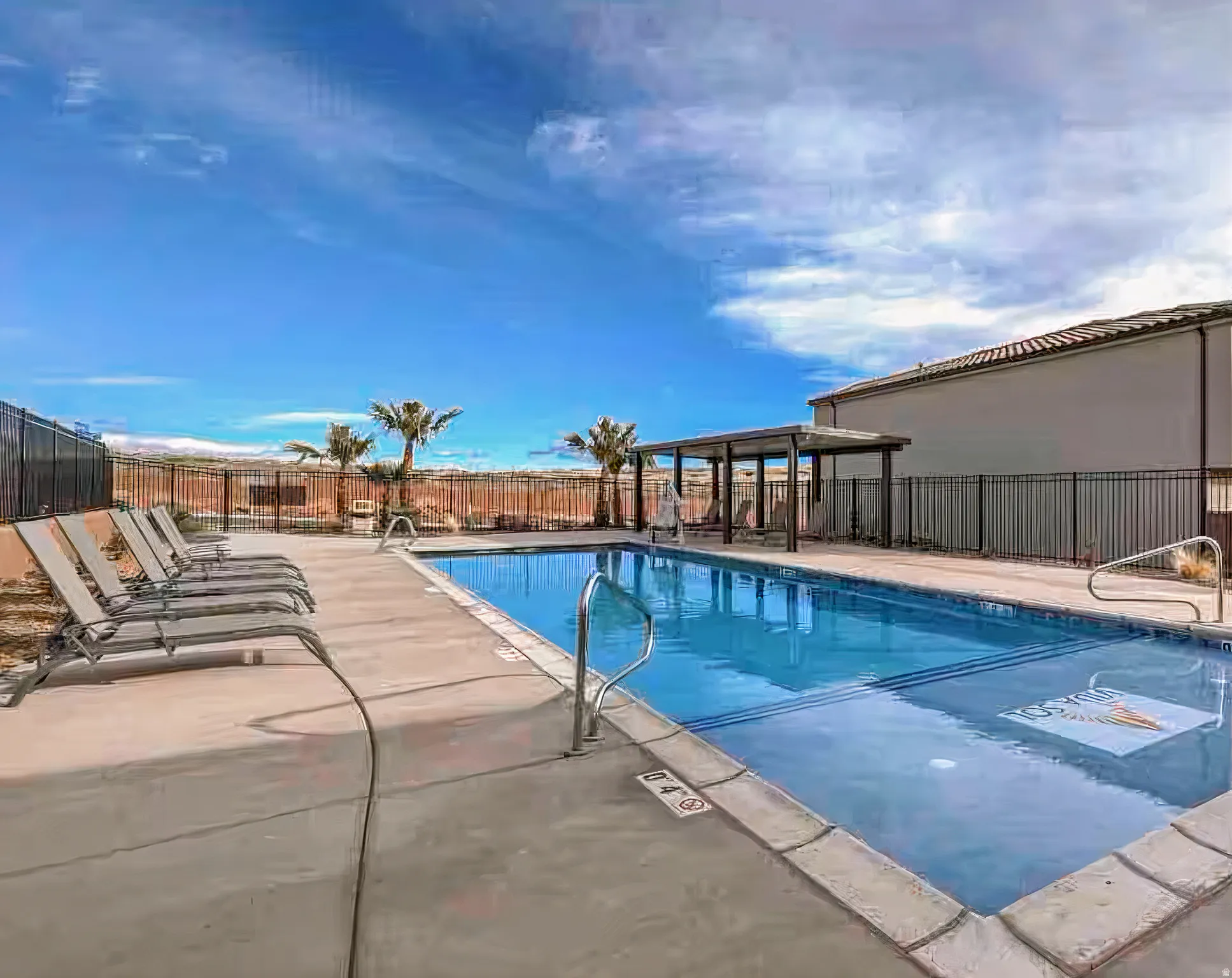 This property is right next to the Community pool as seen in photo