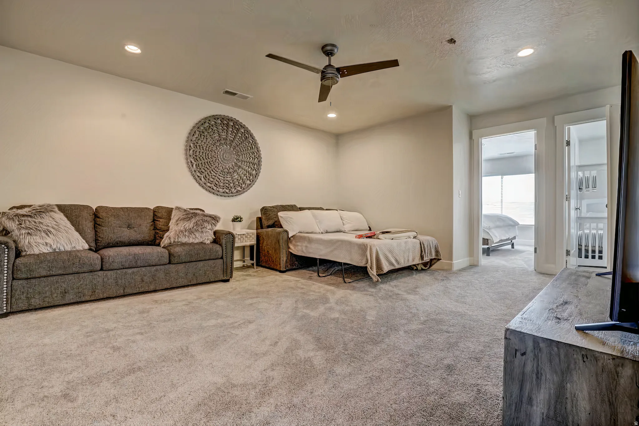 Carpeted bedroom with recessed lighting, ceiling fan, and access to outside