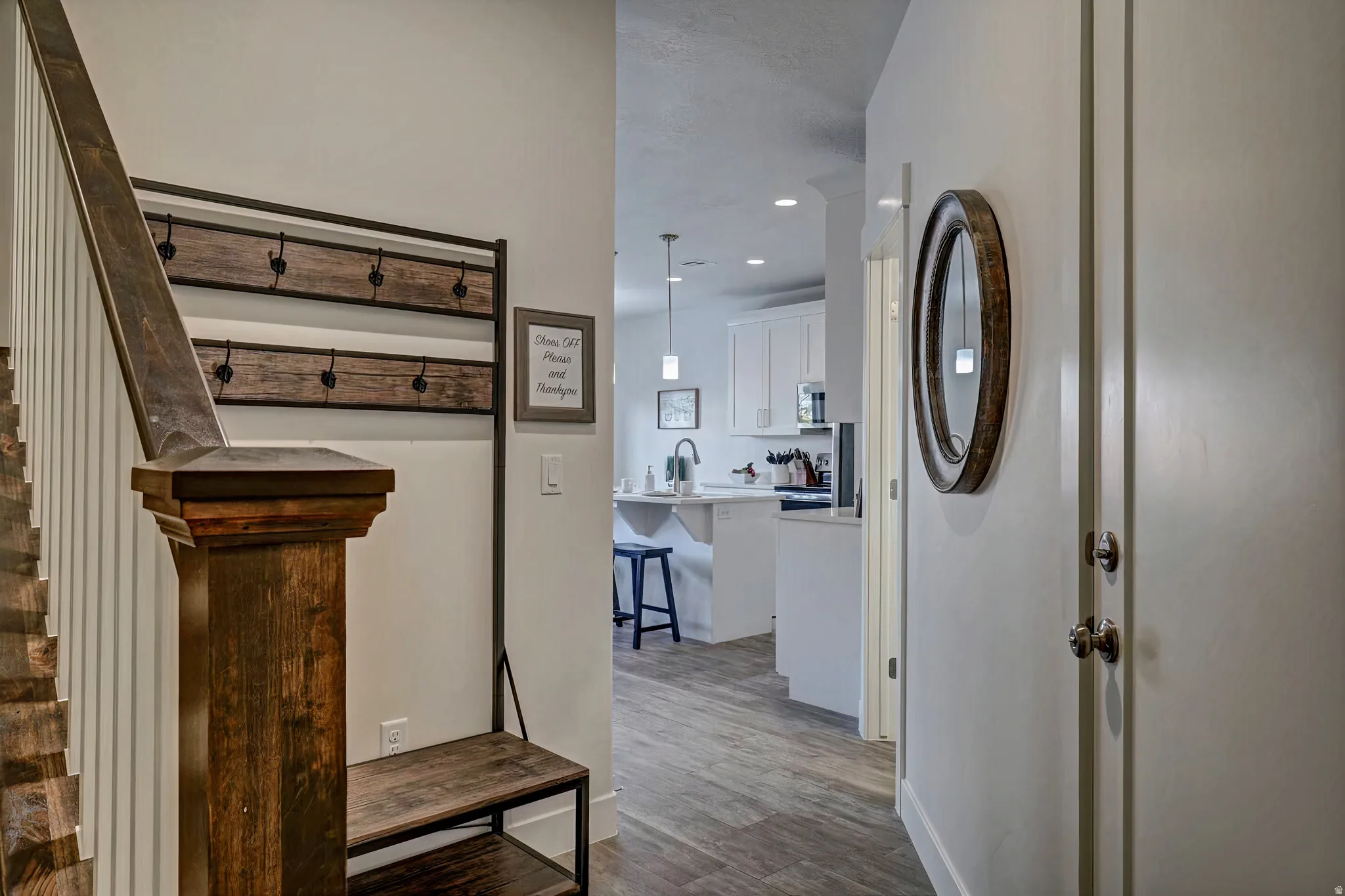 Hallway featuring recessed lighting and light wood finished floors
