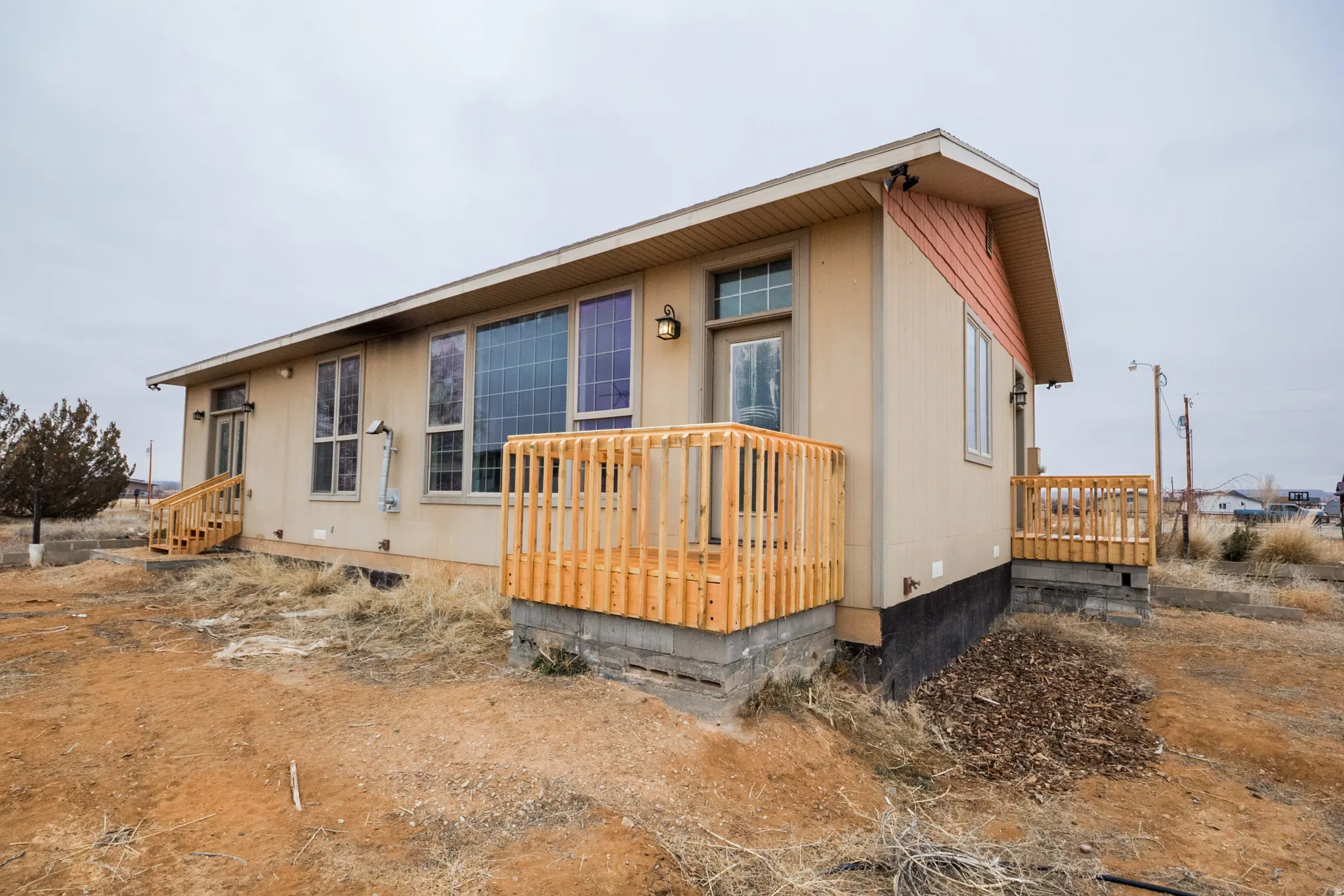Back of property with crawl space