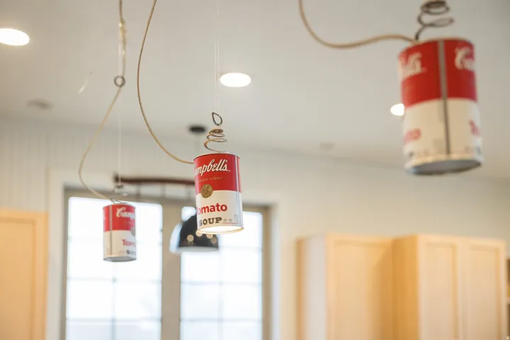 Detailed view of recessed lighting and custom pendant lighting