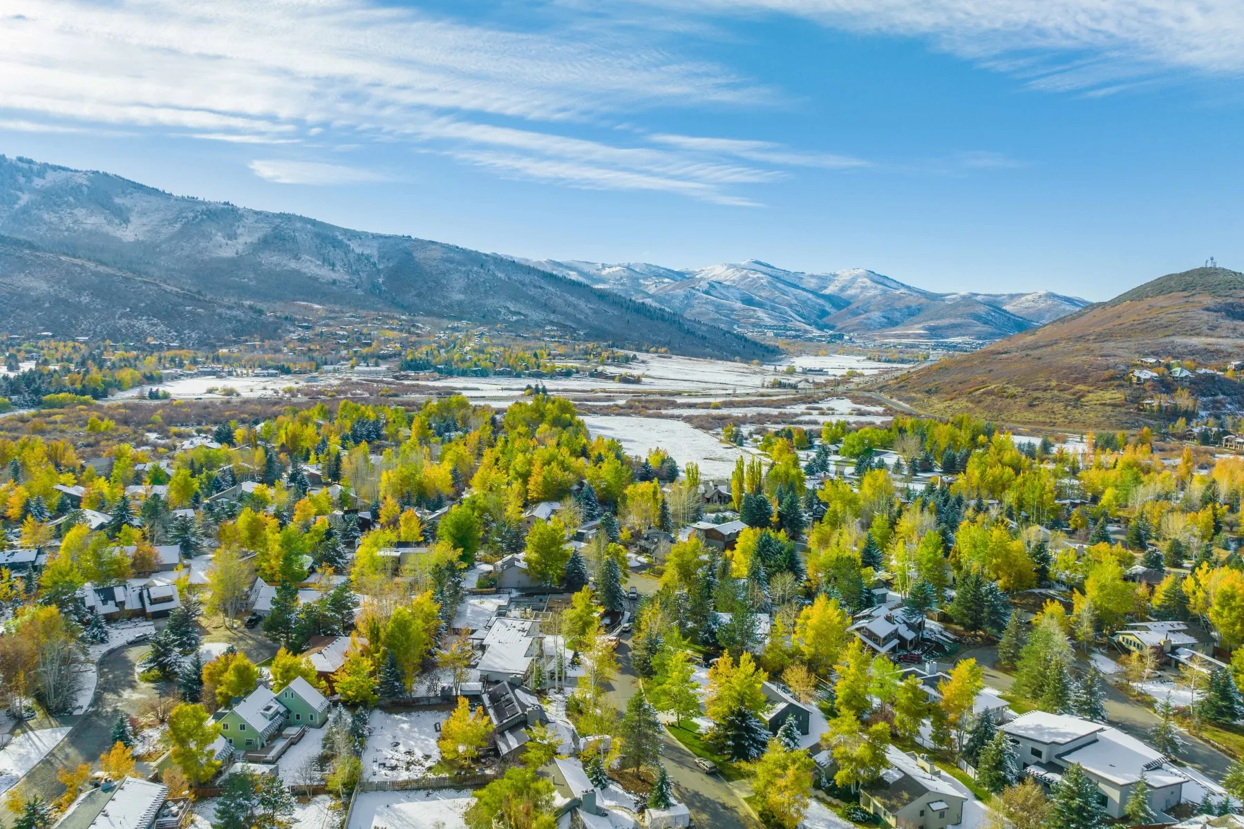View of mountain backdrop with nearby suburban area