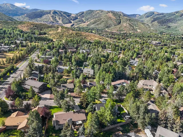 Aerial view of property's location with nearby suburban area