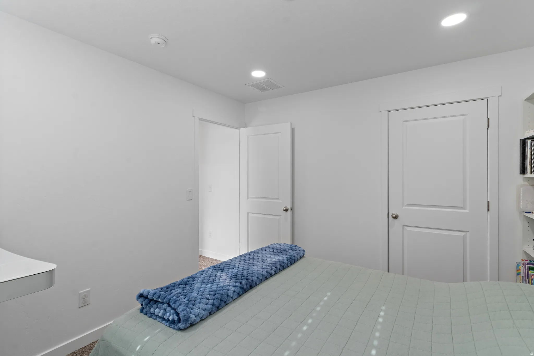 Bedroom with baseboards and recessed lighting