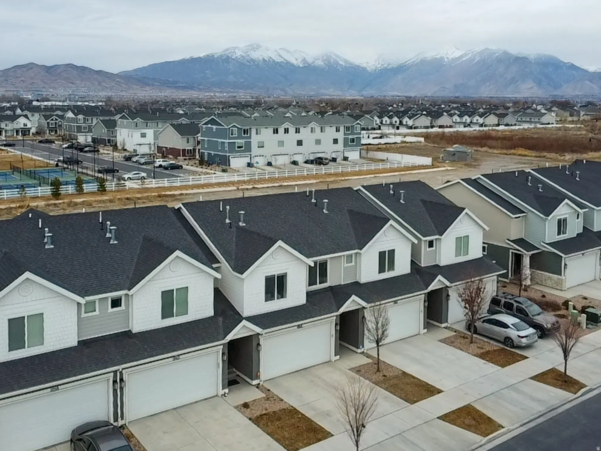 Aerial perspective of suburban area featuring mountains
