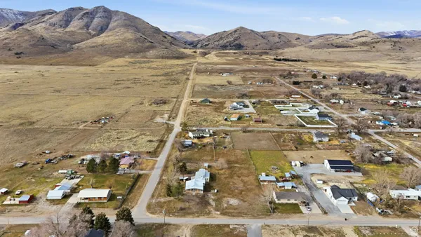 Aerial overview of property's location featuring mountains and rural landscape