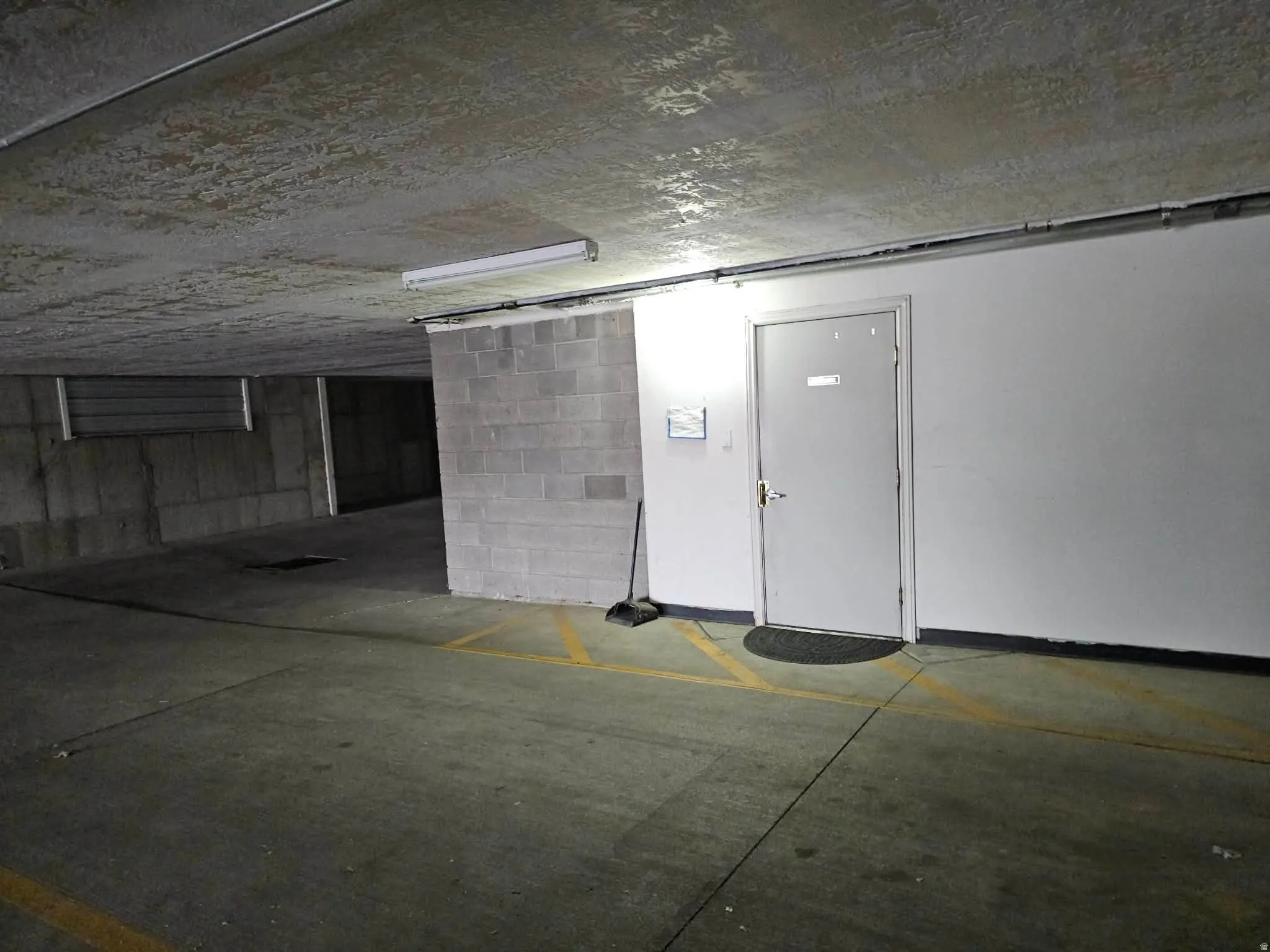 The elevator is located right next to the 2 designated parking spots