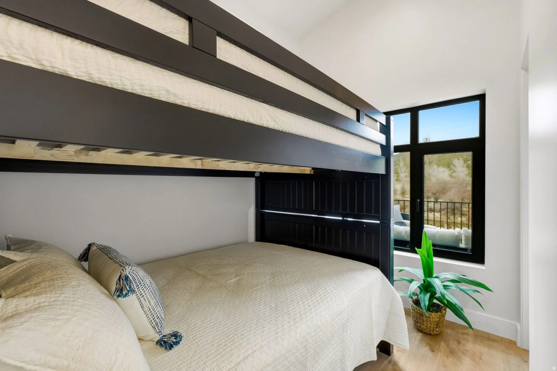 Bedroom with light wood-style flooring