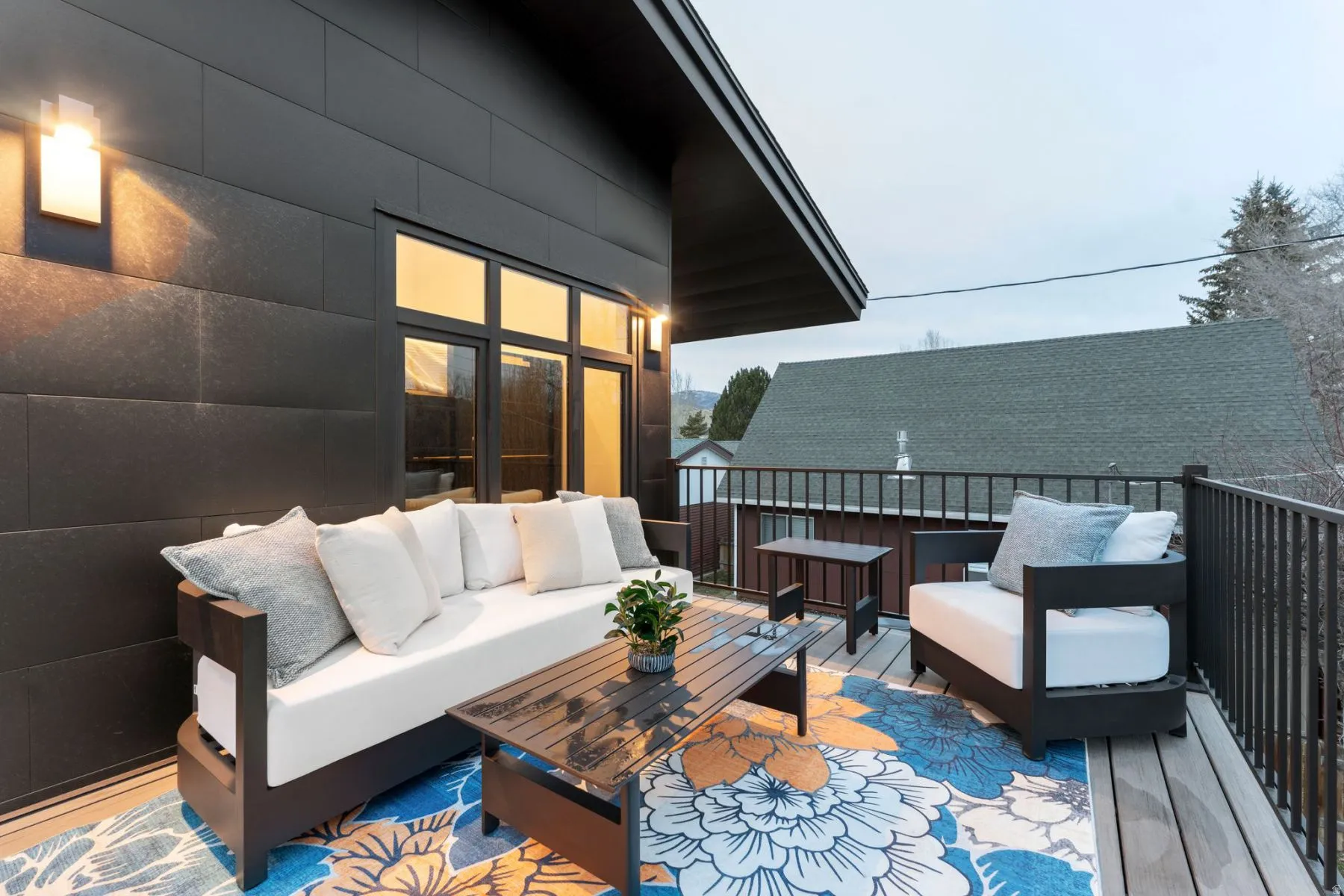 Wooden terrace featuring outdoor lounge area