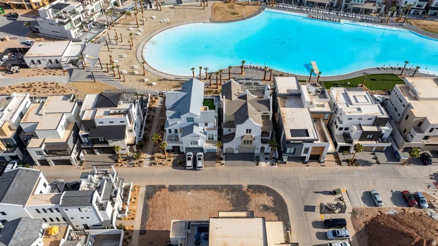 Aerial perspective of suburban area with a pool