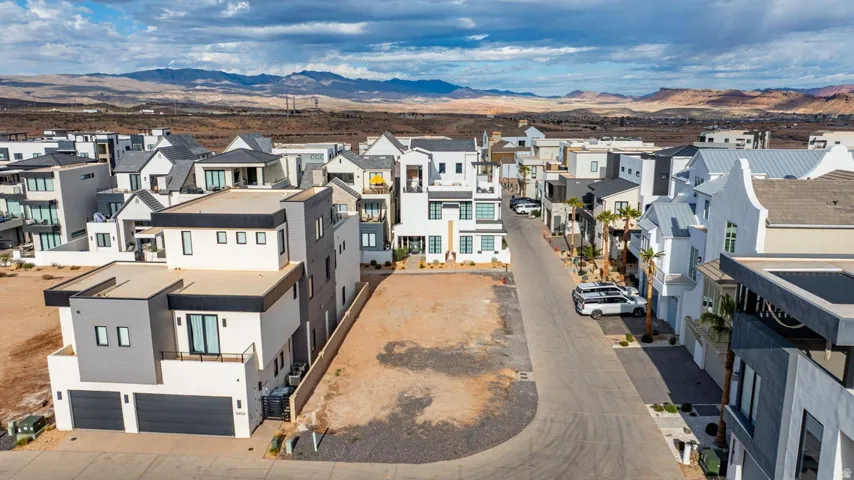 Aerial view of residential area with mountains
