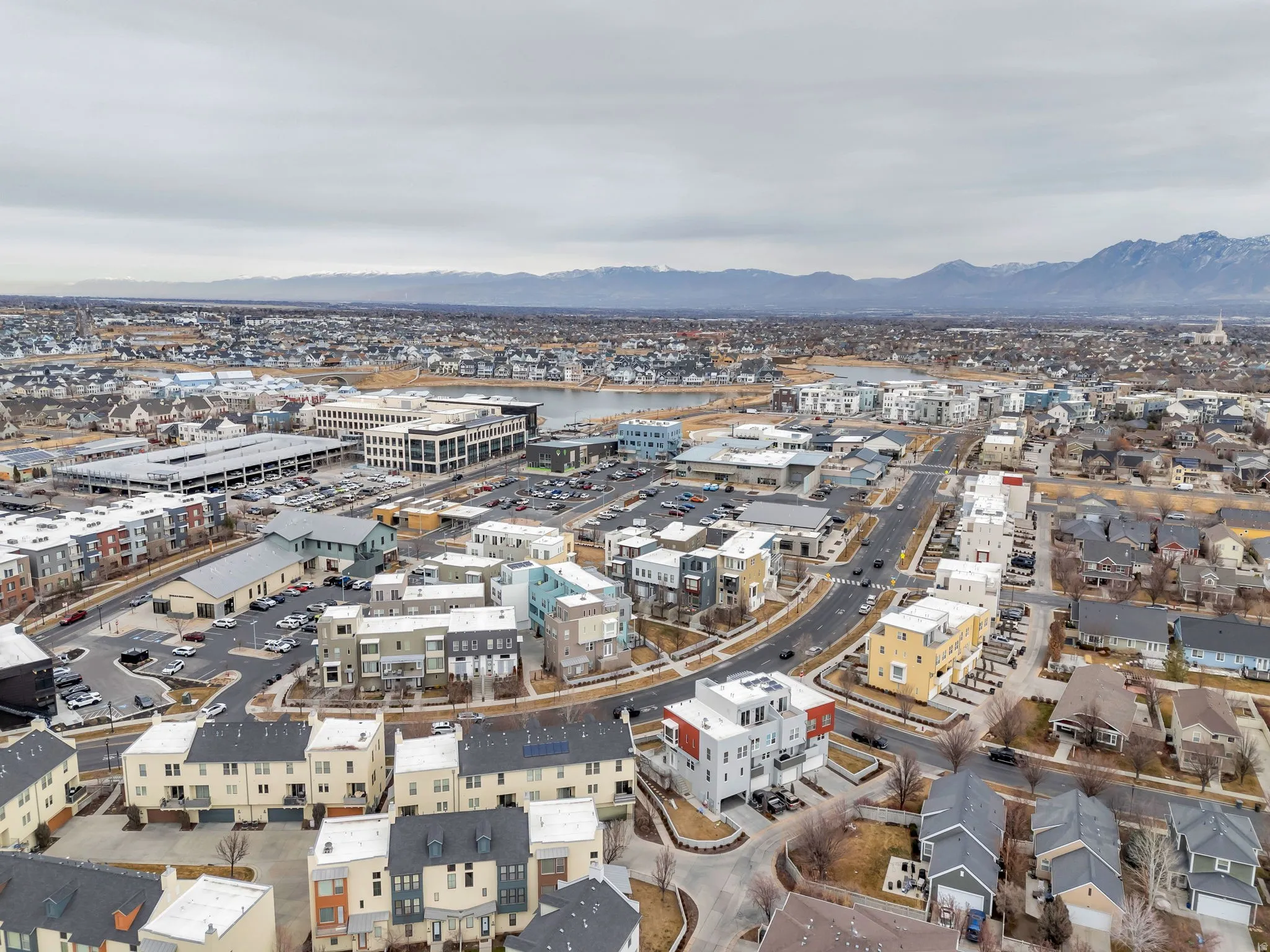 Aerial overview of property's location with a mountainous background and nearby urban area