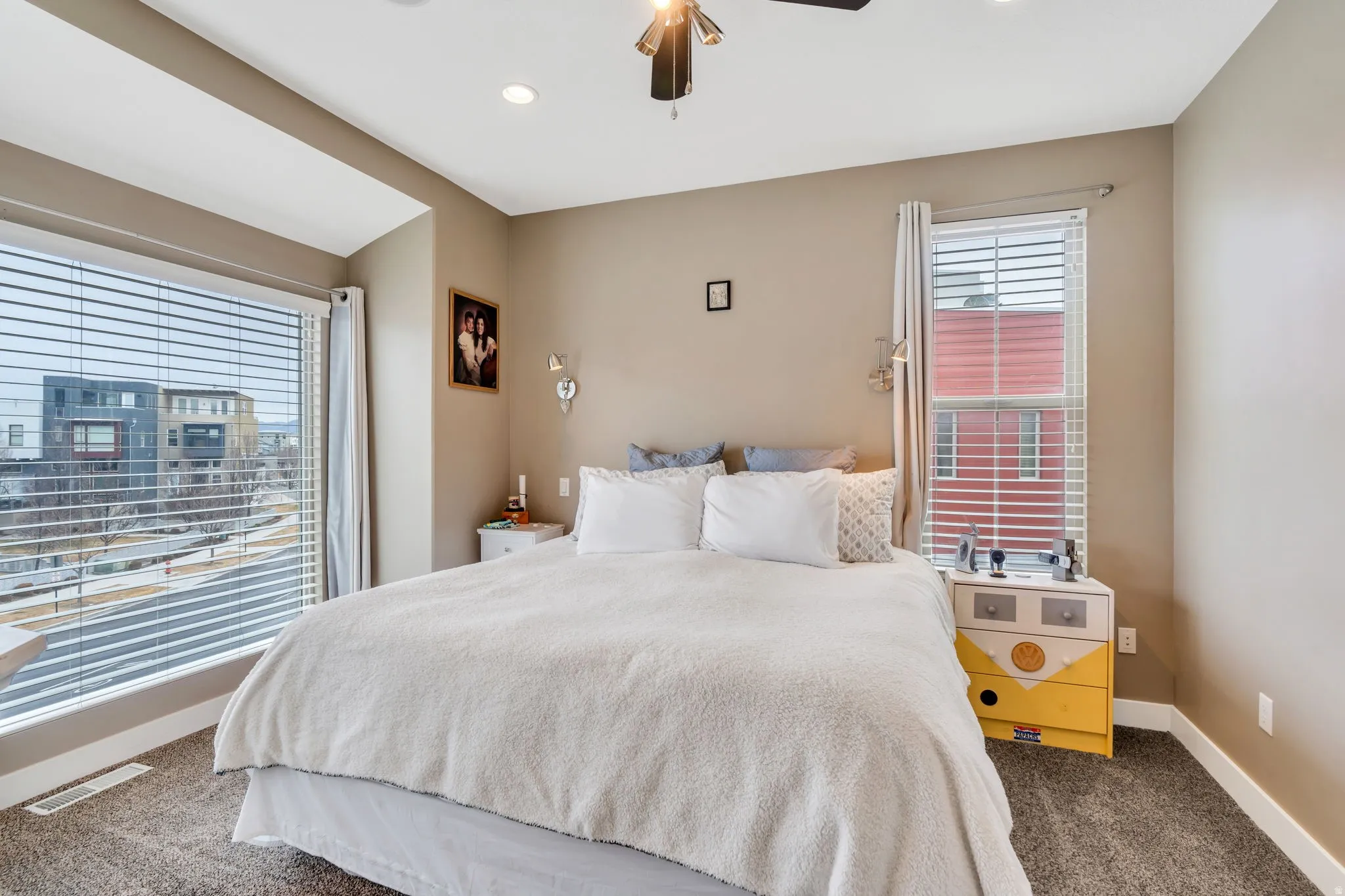 Bedroom with carpet floors, a ceiling fan, and recessed lighting