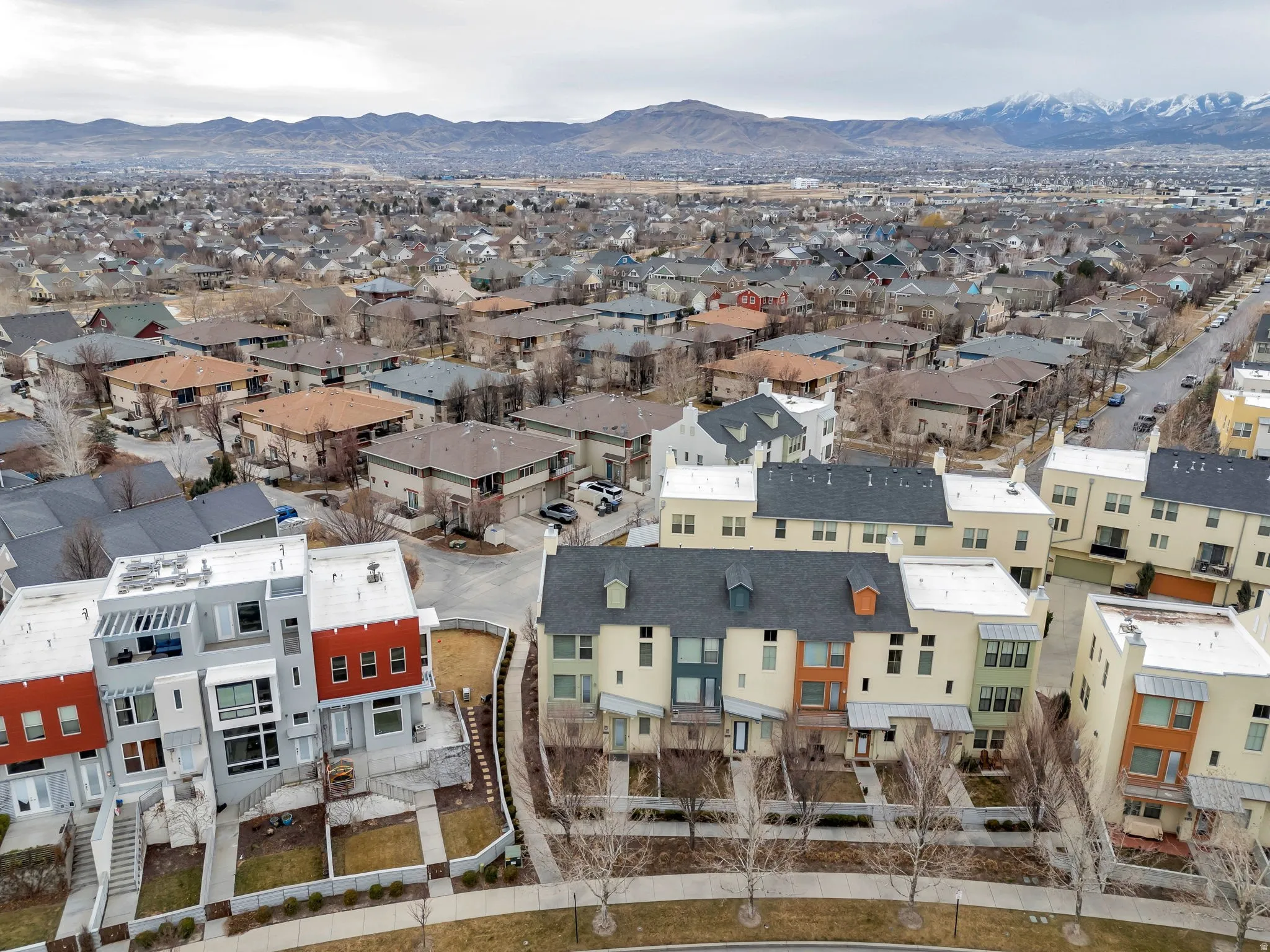 Aerial perspective of suburban area with mountains