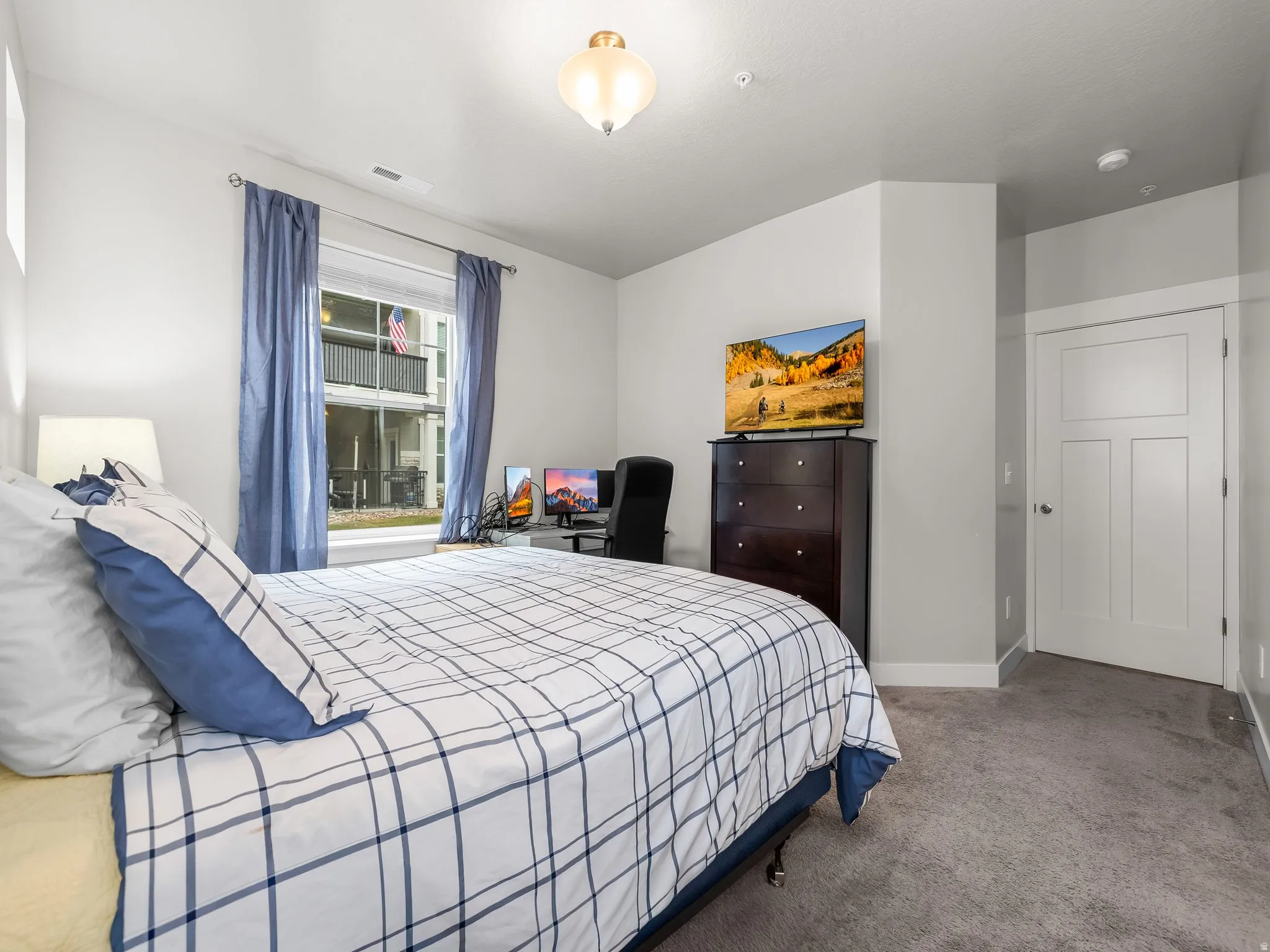 Bedroom featuring carpet