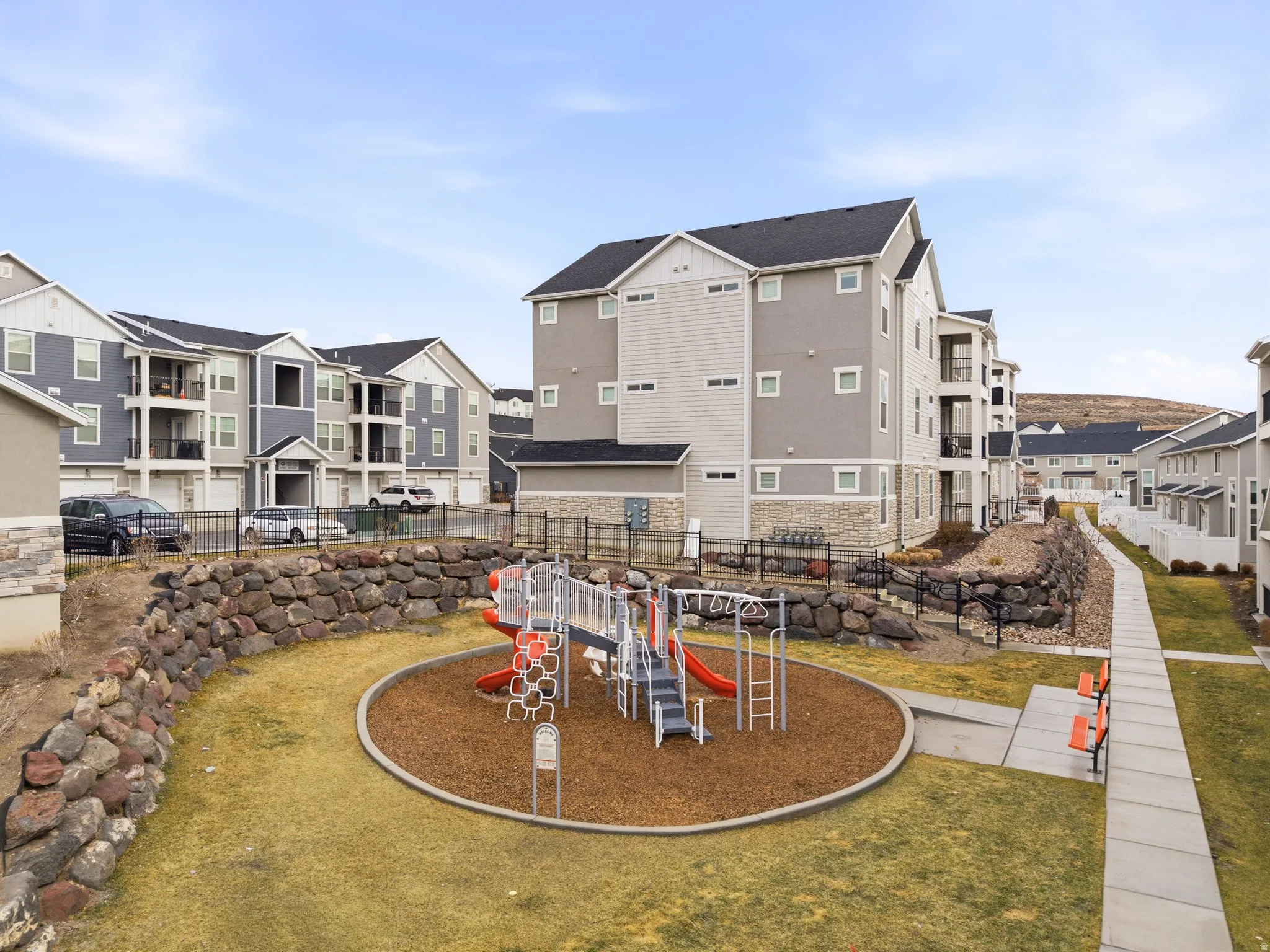 Community playground with a residential view