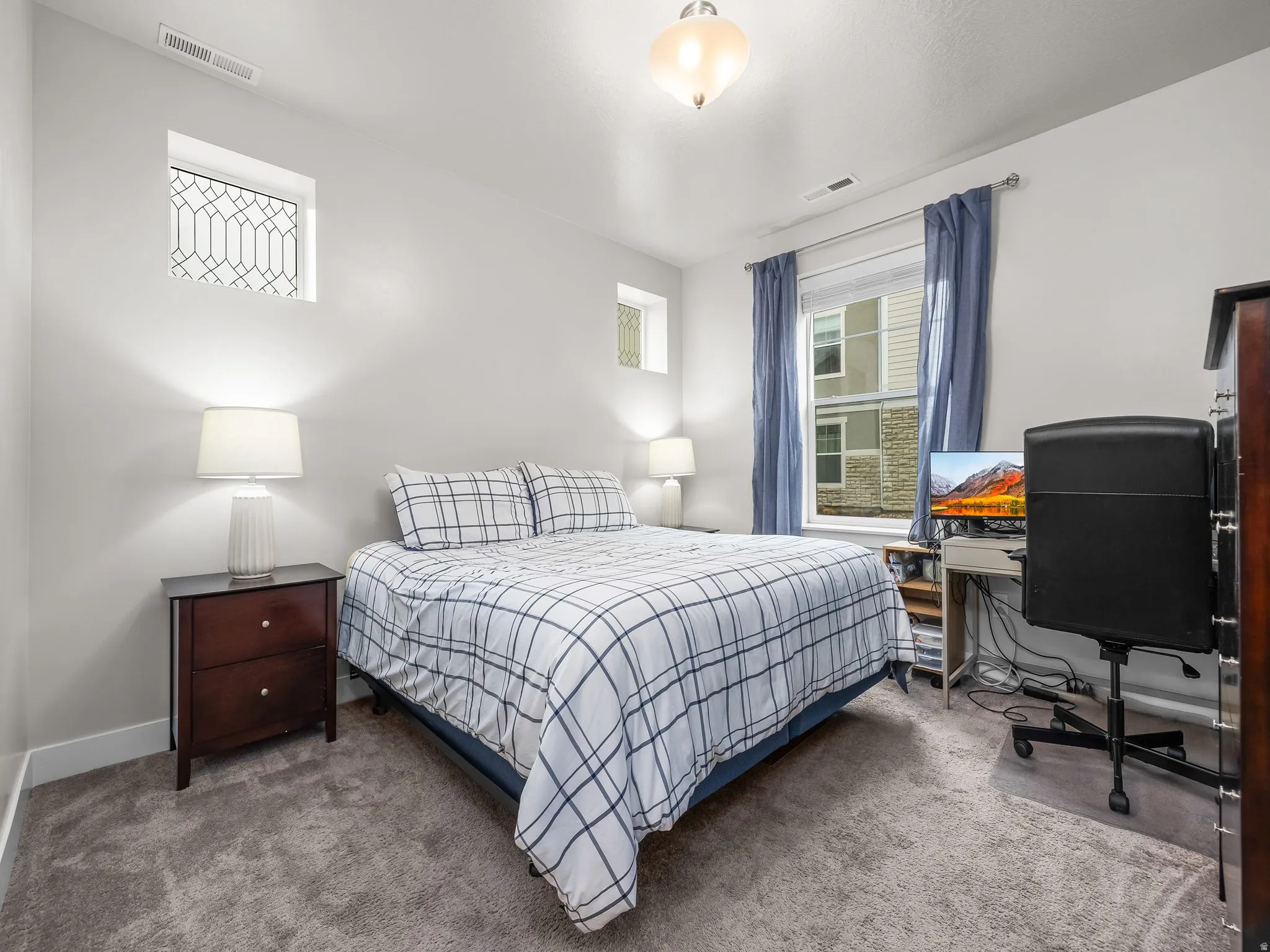 Bedroom featuring carpet
