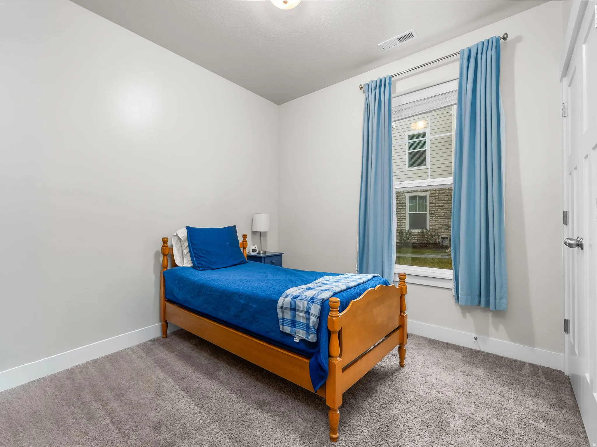 Bedroom featuring carpet