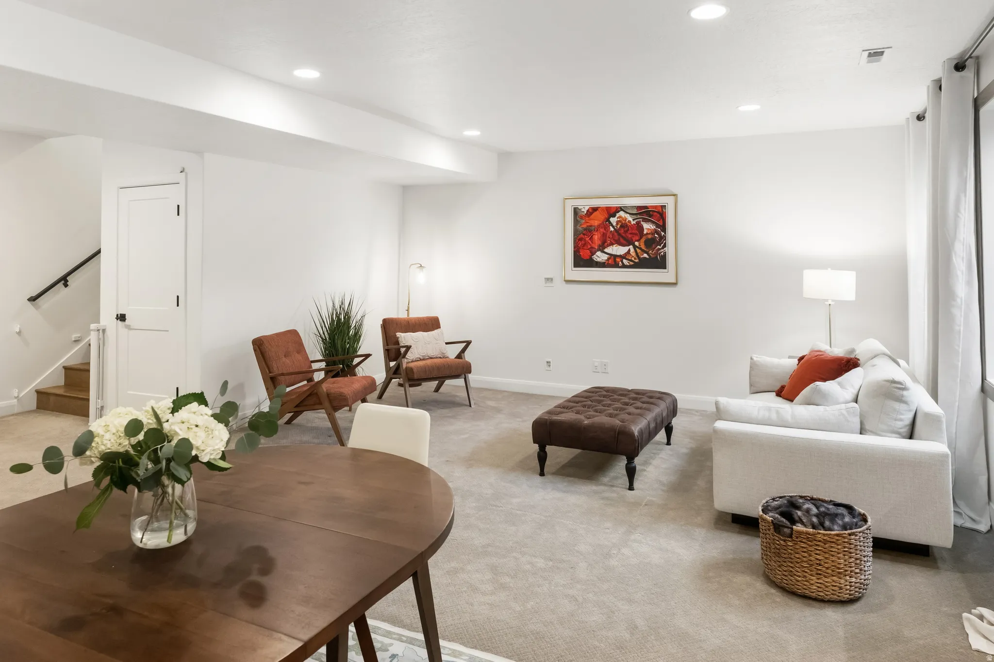 Family room with kitchenette, dining area and recessed lighting