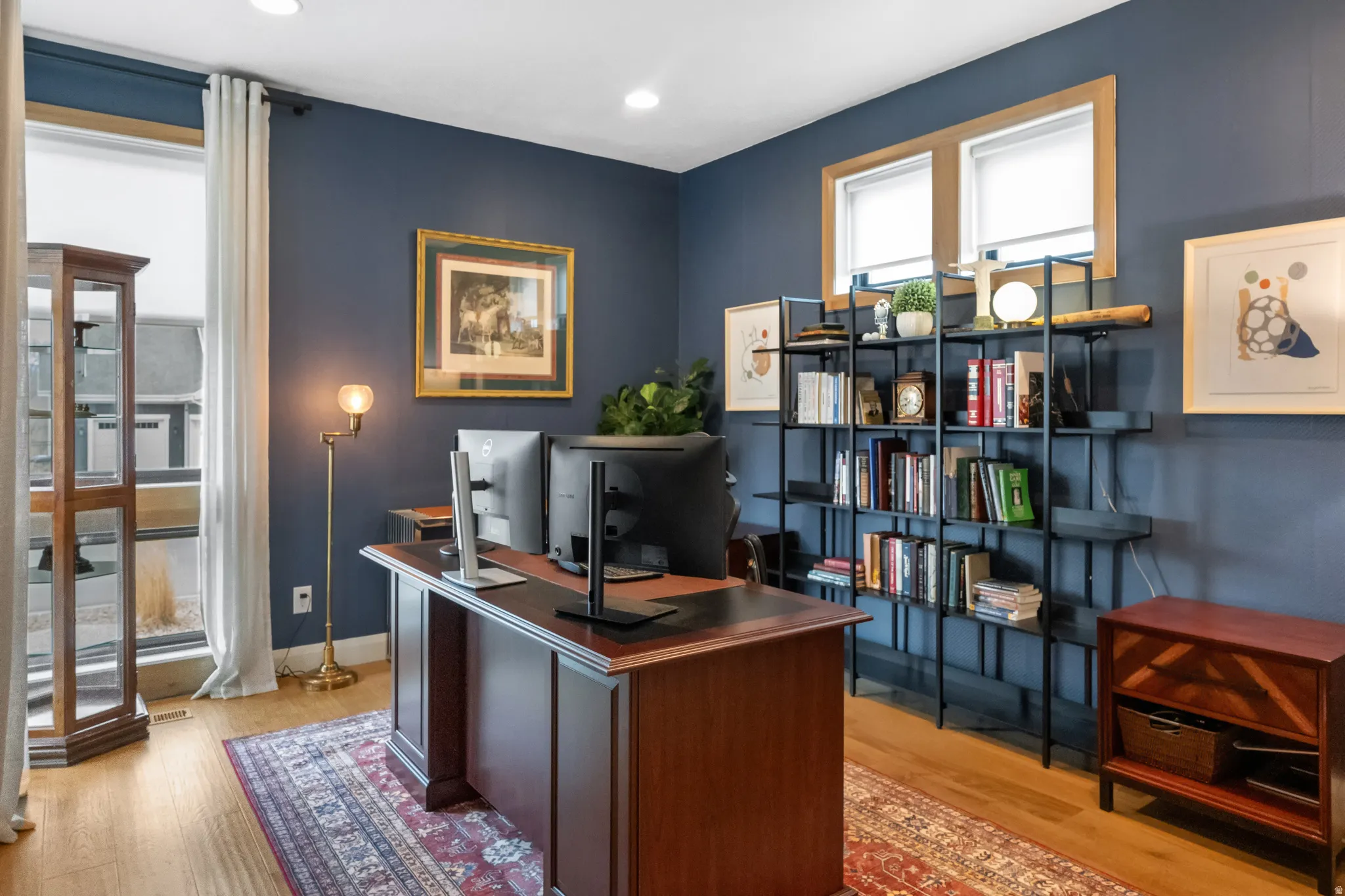 Office with solid white oak flooring and white oak window casings