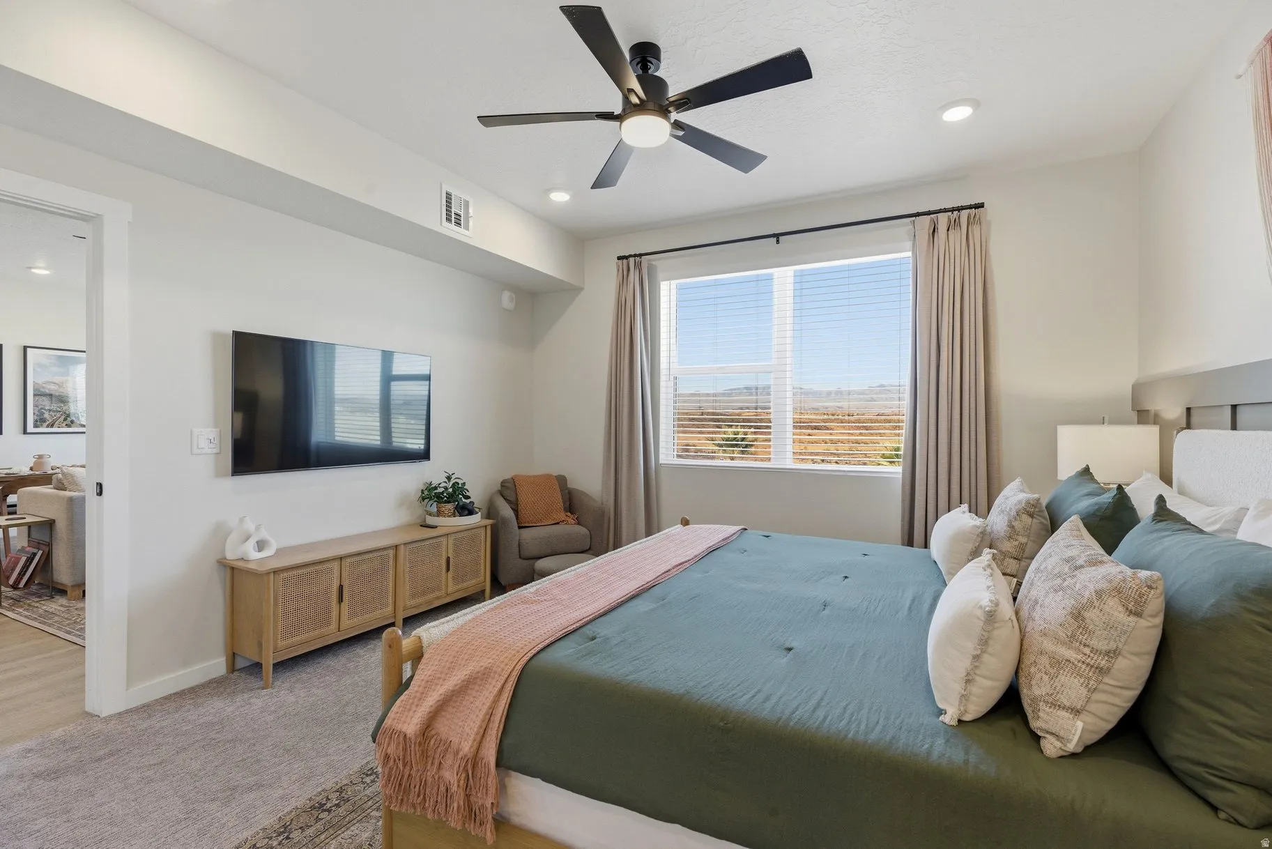 Bedroom with ceiling fan, recessed lighting, and carpet floors