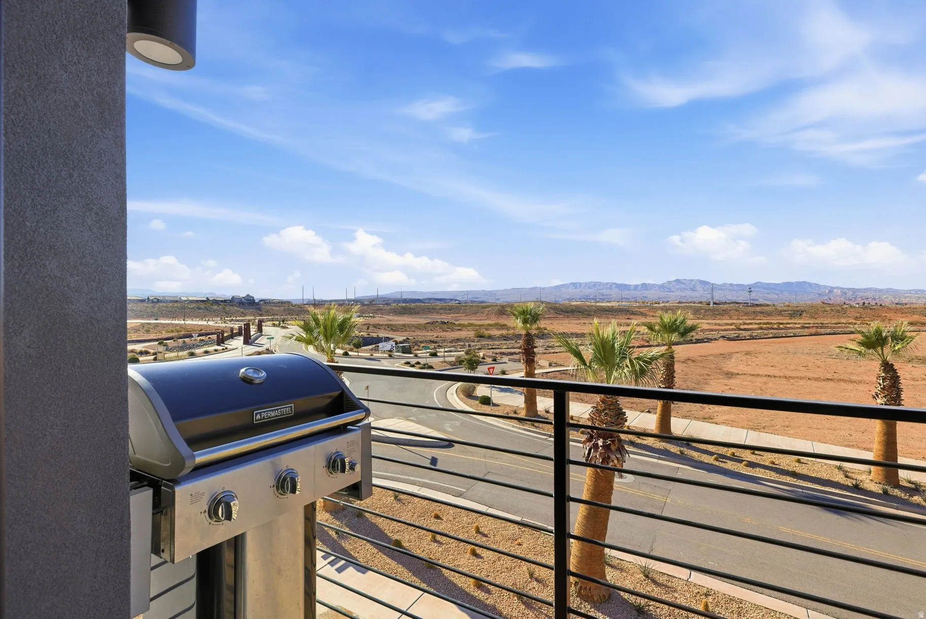 Balcony with a grill and a mountain view