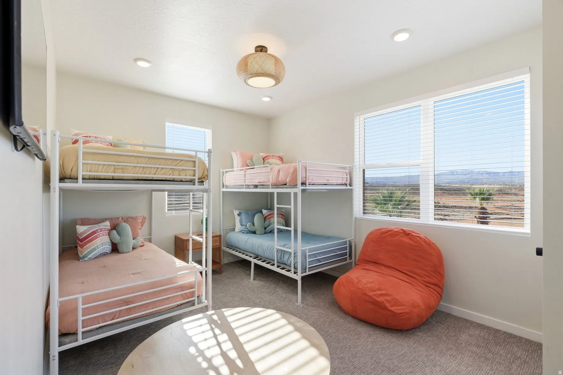 Bedroom with light carpet and recessed lighting