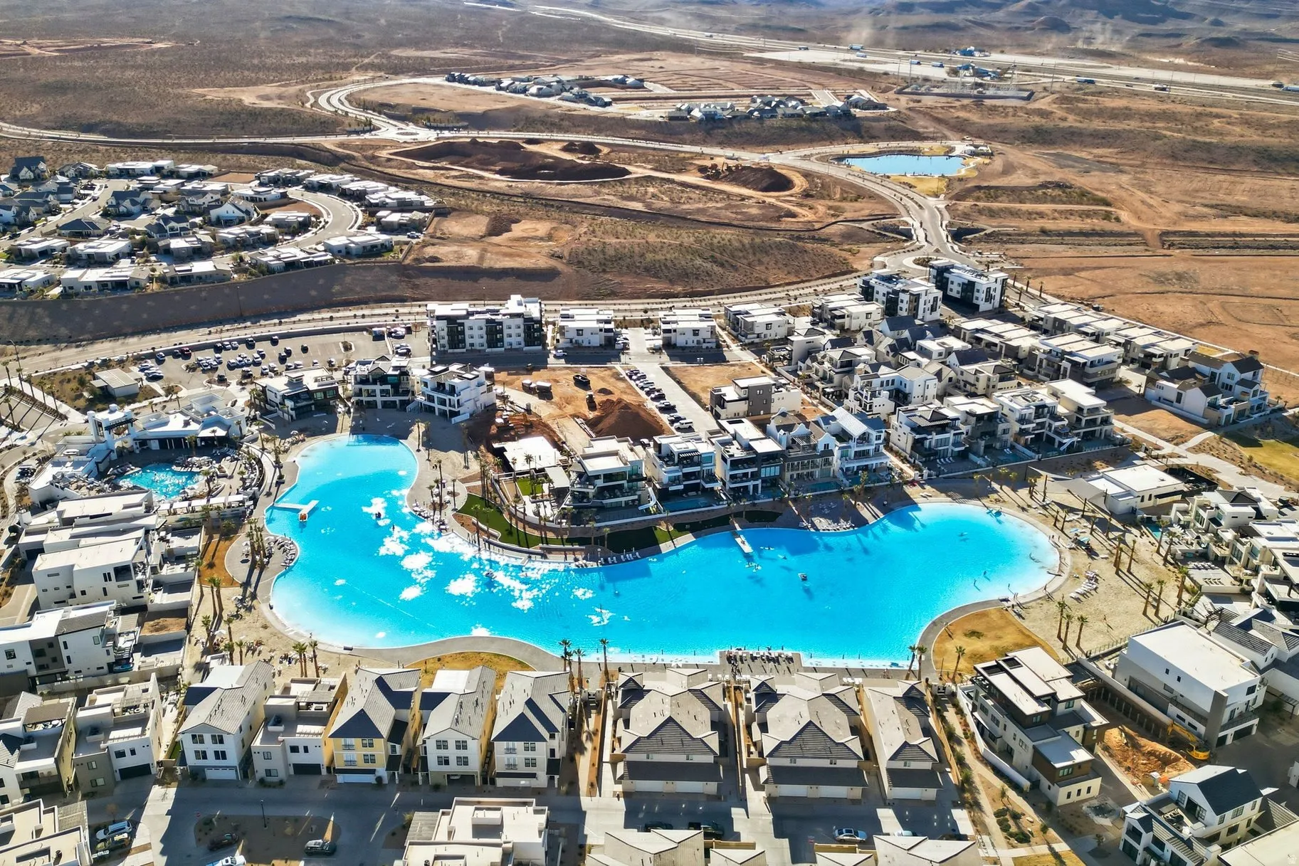 Aerial view of property's location featuring a pool area