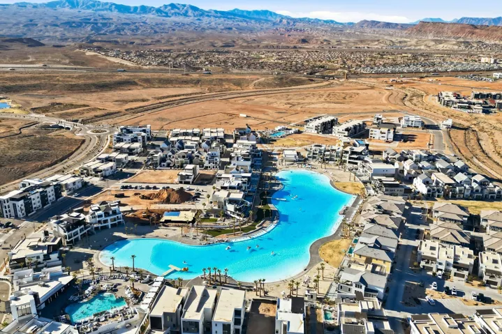 Bird's eye view of a mountain backdrop and a pool