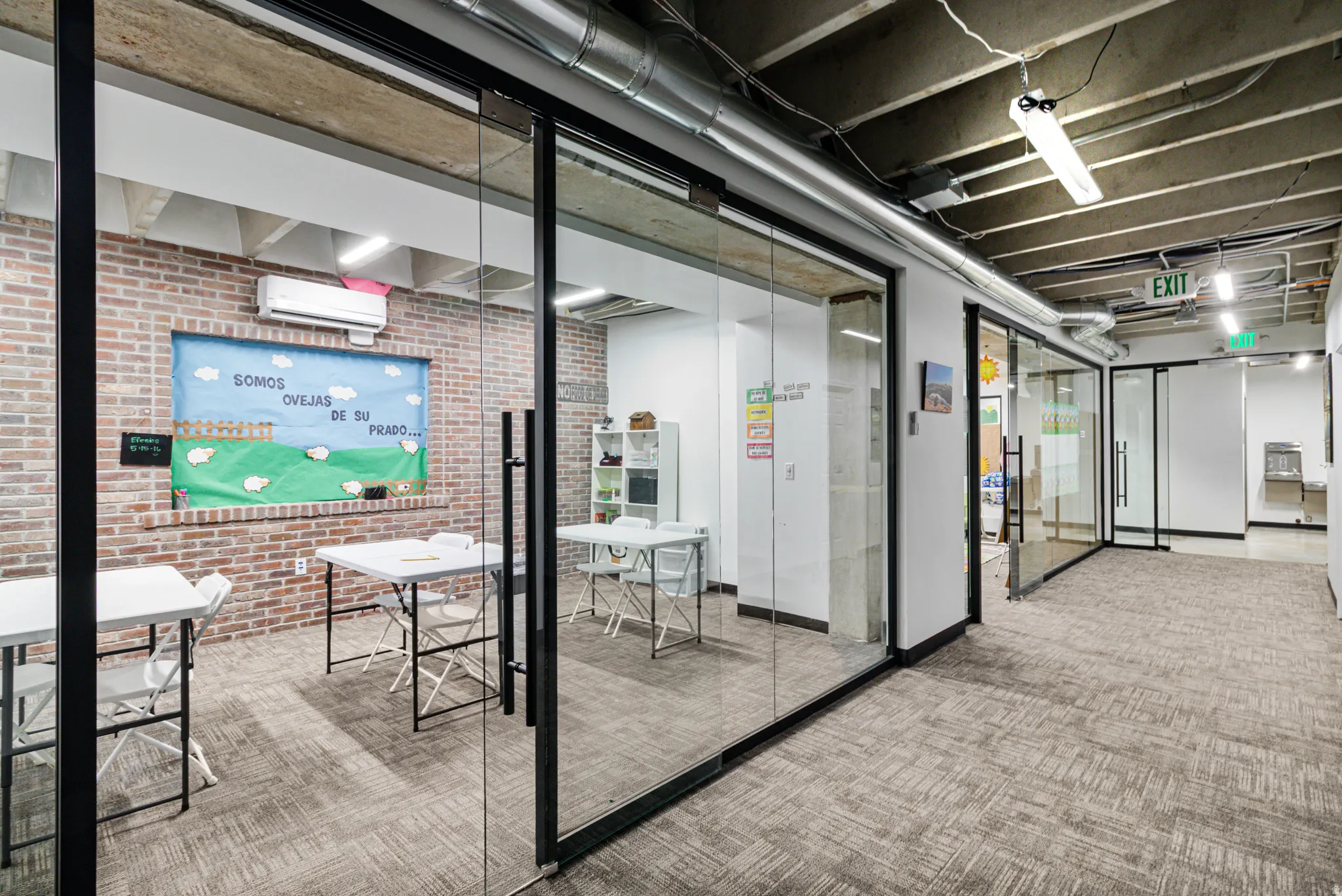 Common area with brick wall