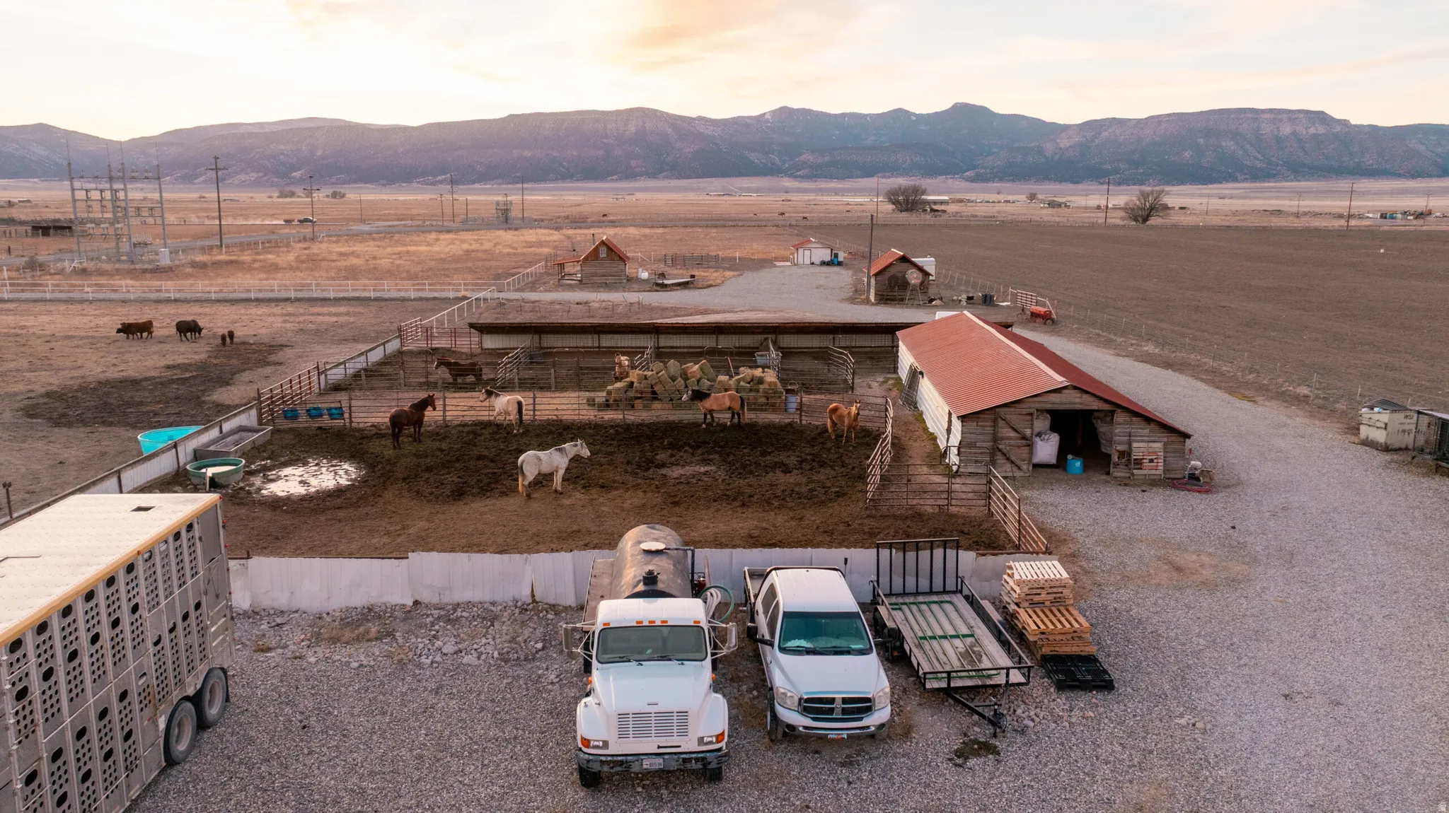 Aerial view of sparsely populated area with a mountain backdrop
