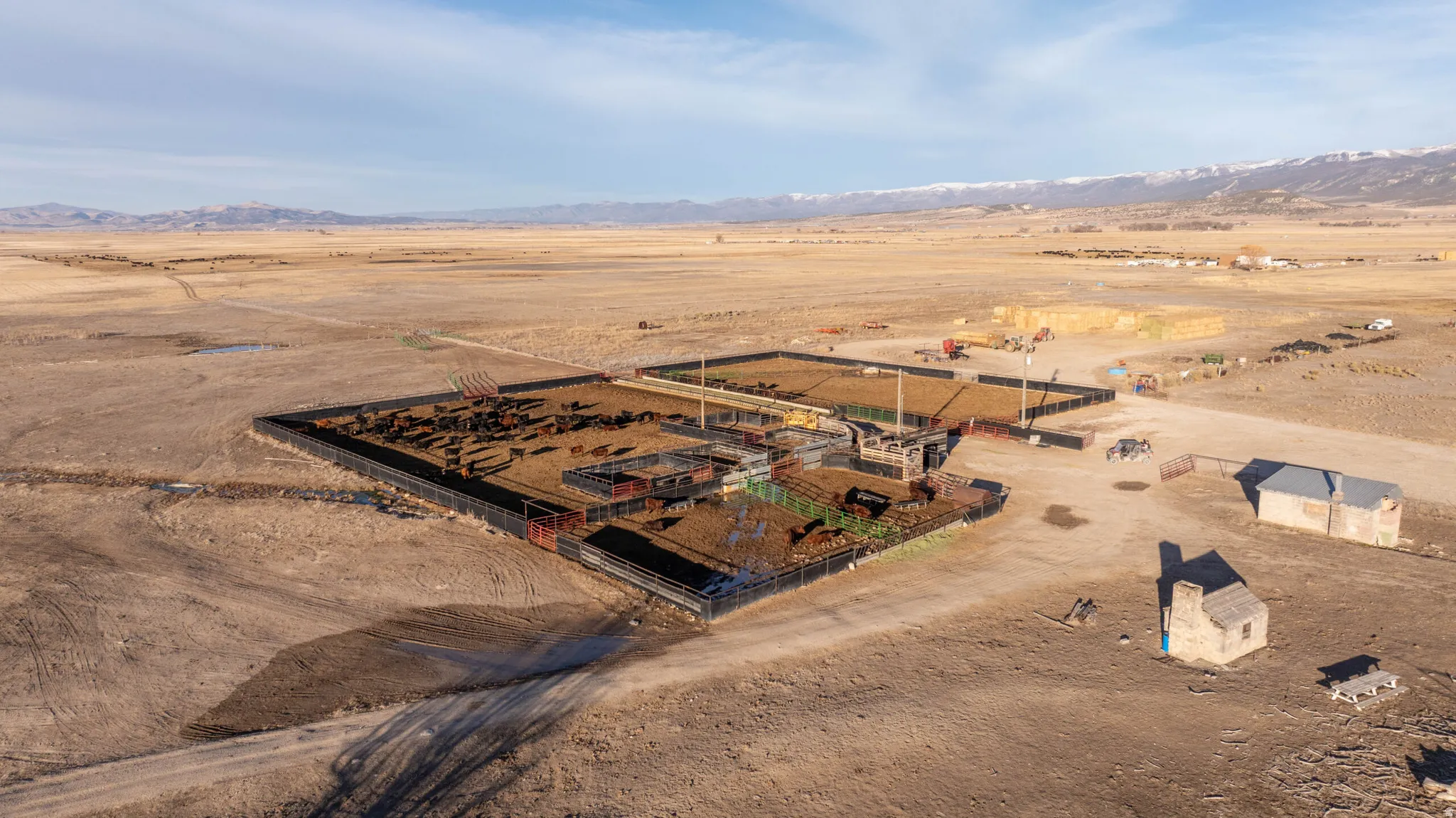 Aerial view of sparsely populated area with a mountainous background