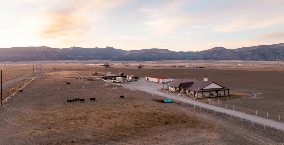 Aerial view at dusk of a view of countryside and a mountain view