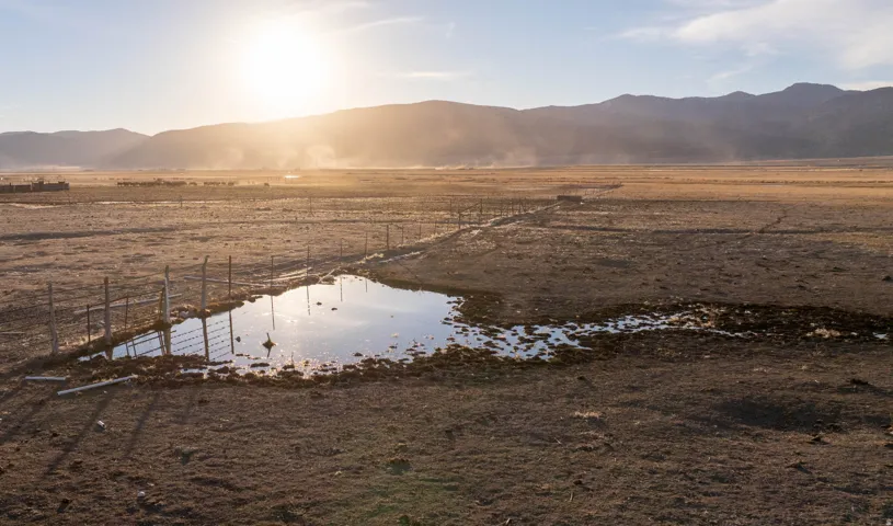 Water view featuring rural landscape and a mountain backdrop