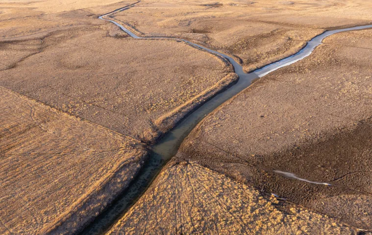 Aerial view of sparsely populated area with a desert landscape